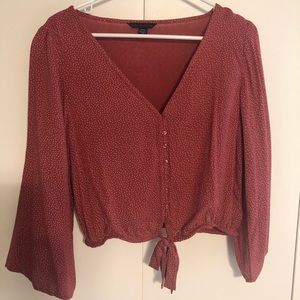 Red blouse peekaboo mid section